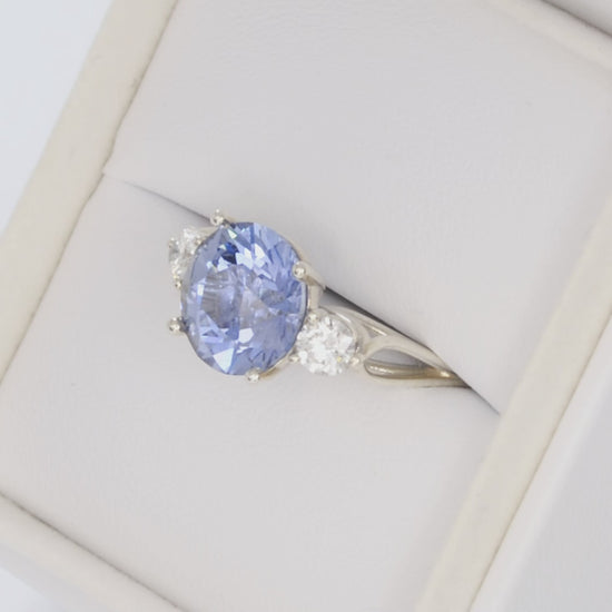 emryn three stone ring with round blue lab sapphire in silver