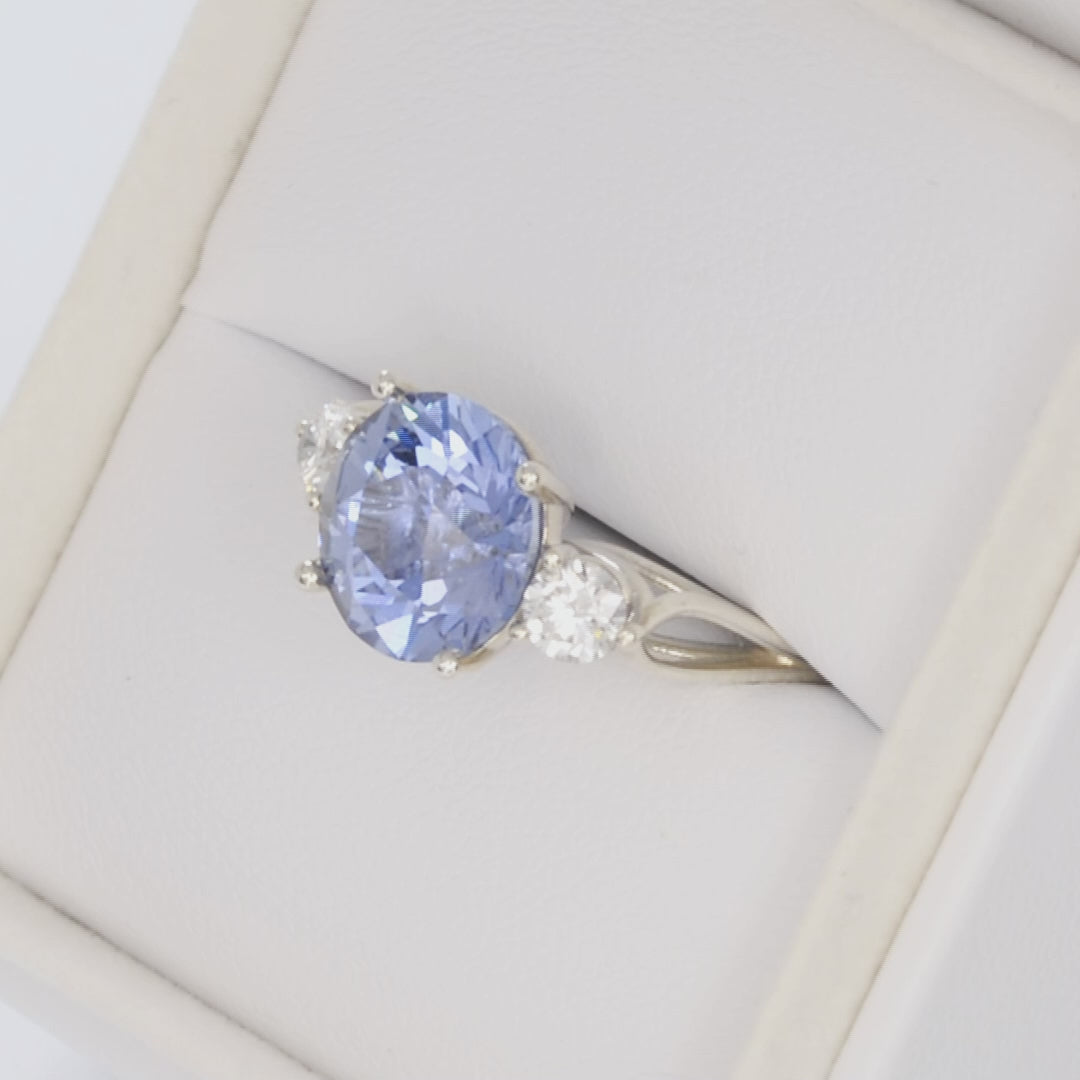 emryn three stone ring with round blue lab sapphire in silver
