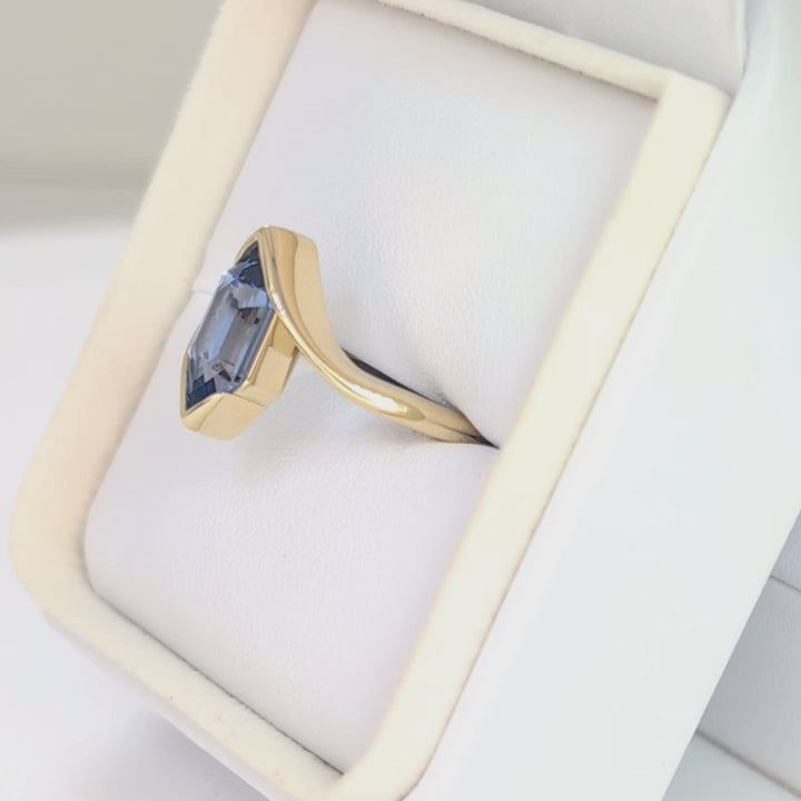 olivia solitaire ring in yellow gold with blue lab sapphire dutch marquise