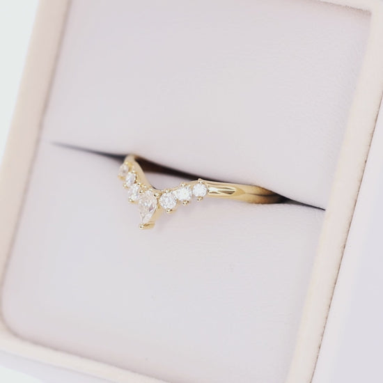 fia contour wedding band in yellow gold with moissanites