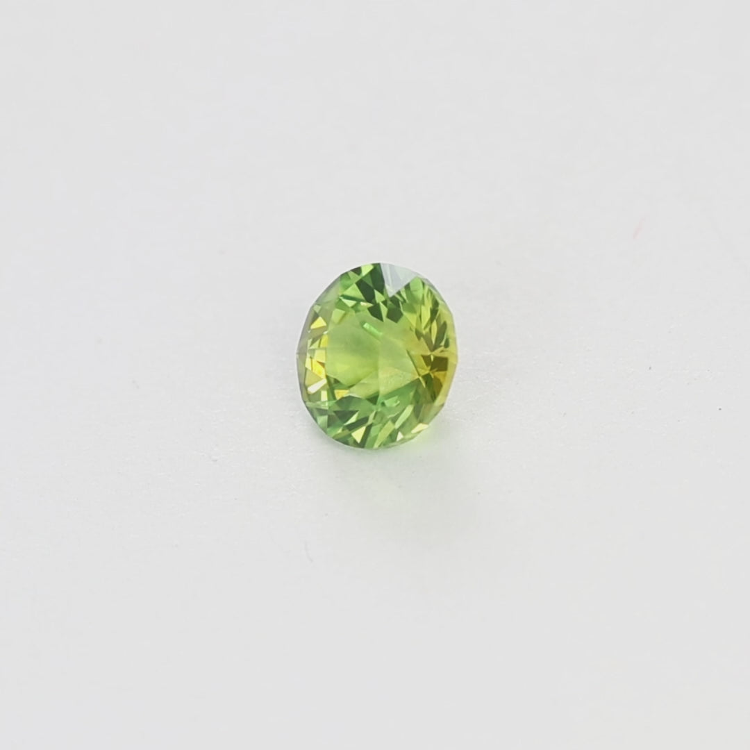 AU0144 1.19ct bi-color yellow and green stormlight round australian sapphire