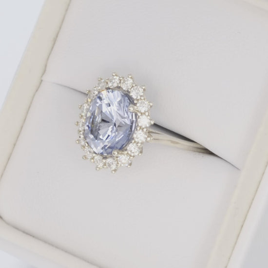 calypso halo engagement ring in silver with oval blue lab sapphire