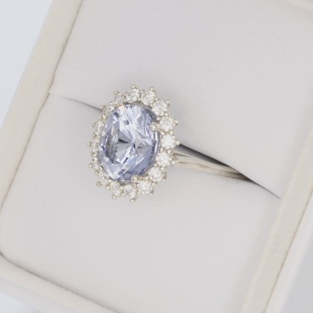 calypso halo engagement ring in silver with oval blue lab sapphire