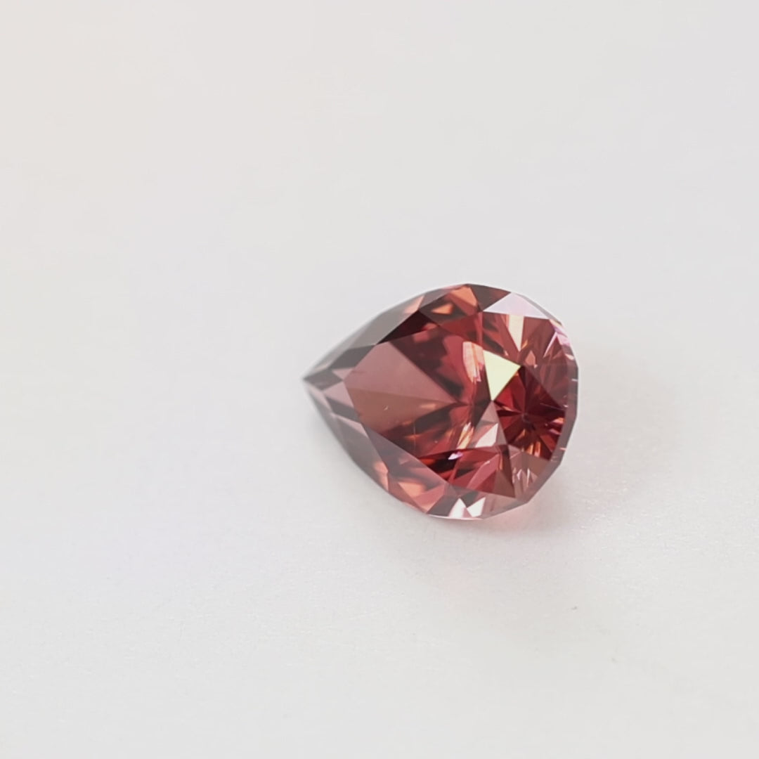 ZR0135 3.21ct eden pear copper-red zircon
