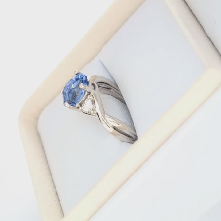 rosa three stone ring with oval blue lab sapphire