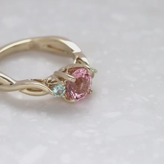 ines engagement ring with pink lab sapphire in yellow gold