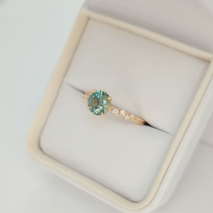 Penolope engagement ring with round sapphire