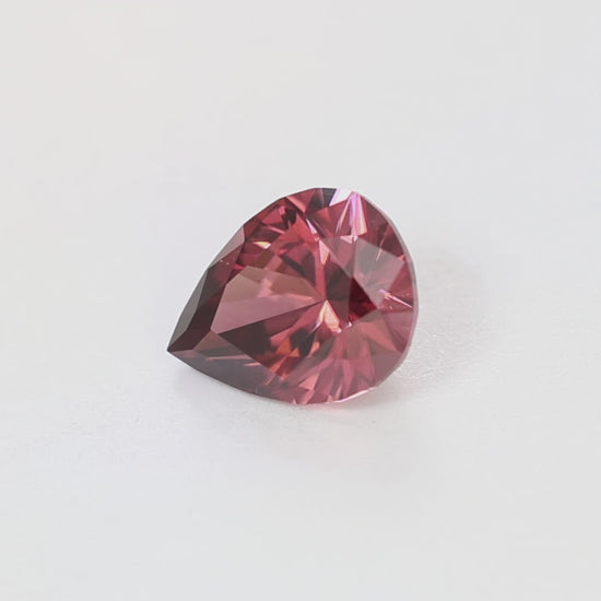 ZR0137 3.38ct eden pear dark pink zircon
