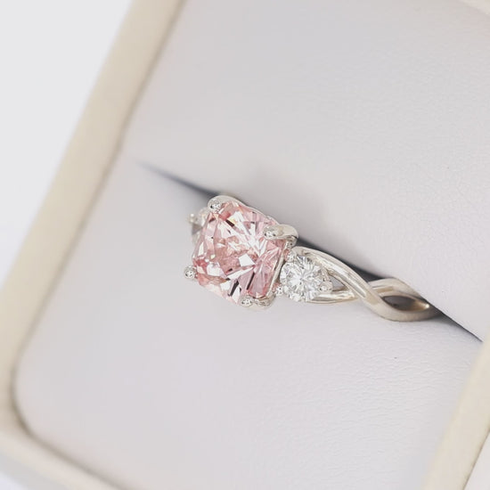 shasta three stone ring in silver with peach lab sapphire asscher