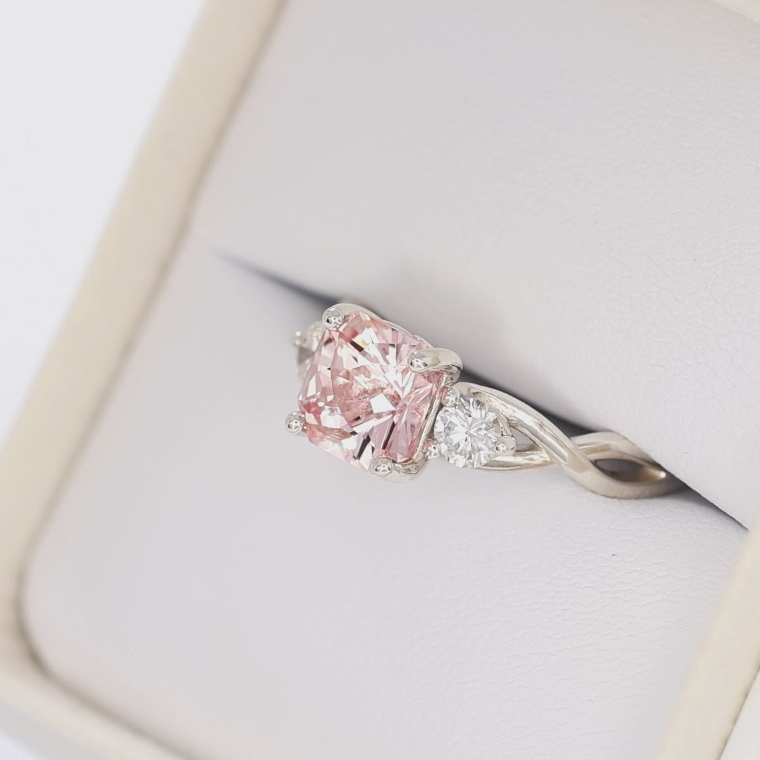 shasta three stone ring in silver with peach lab sapphire asscher