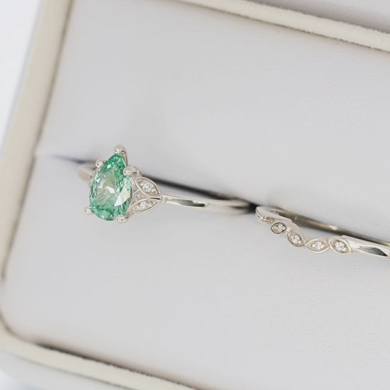 krystal accented engagement ring in silver with eden pear sage green lab sapphire