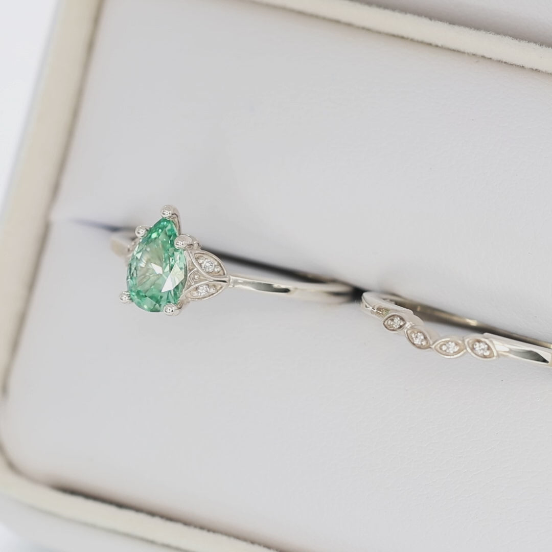 krystal accented engagement ring in silver with eden pear sage green lab sapphire