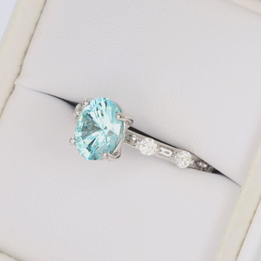 Nyla accented ring in white gold with oval blue-green lab gem