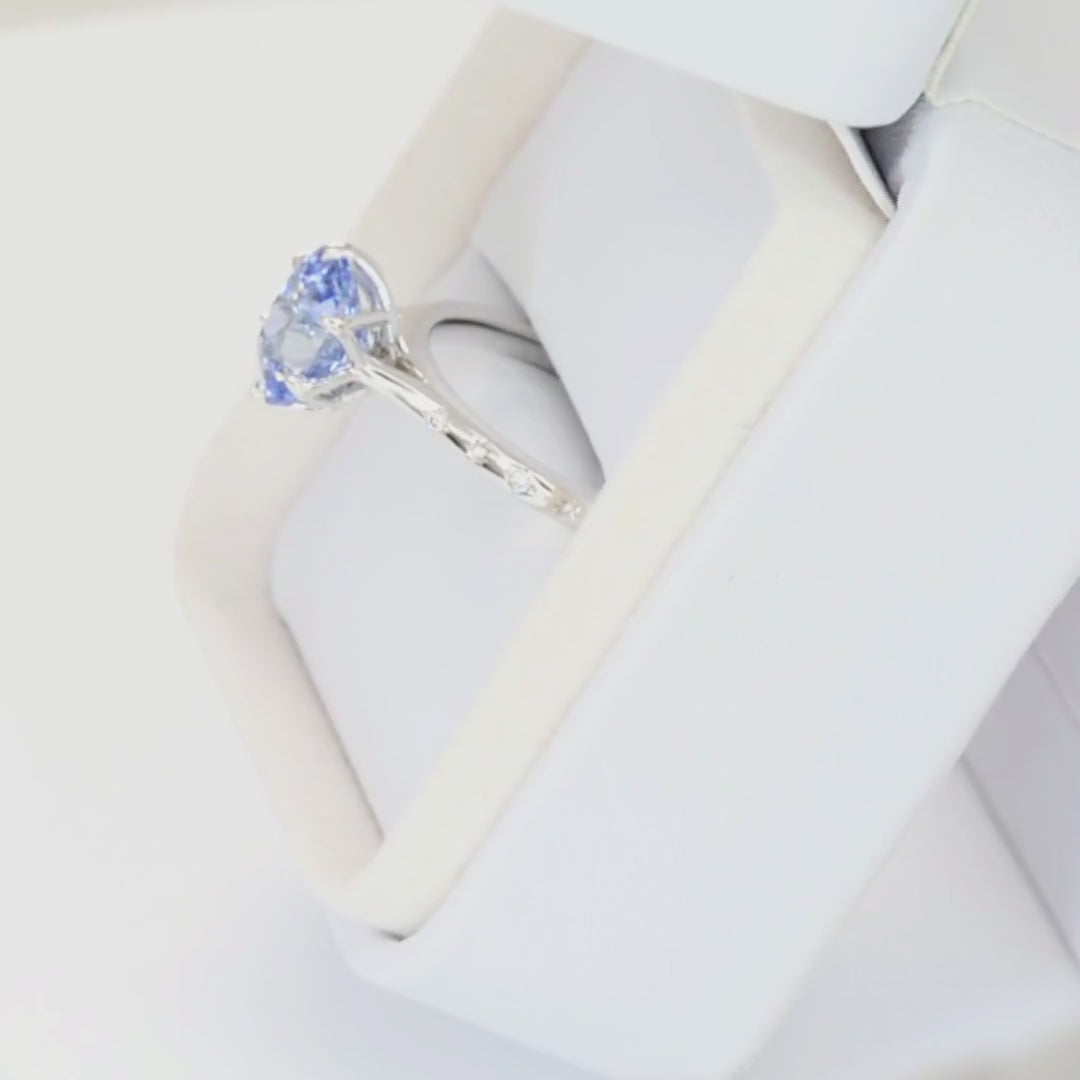 estel accented ring in white gold with elongated cushion light blue lab sapphire