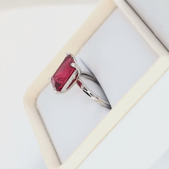 cali solitaire ring with step cut lab ruby