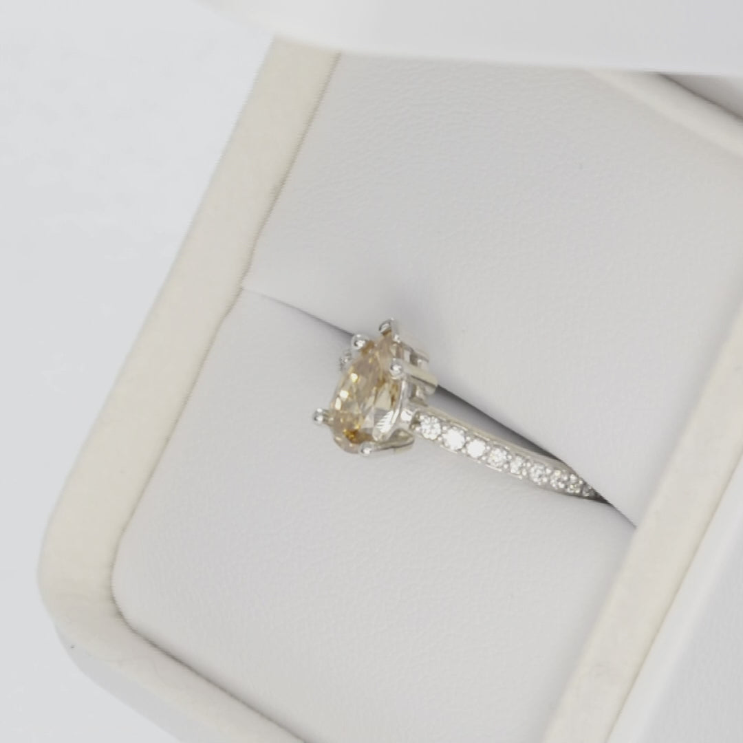 liv accented engagement ring with golden moissanite pear in white gold