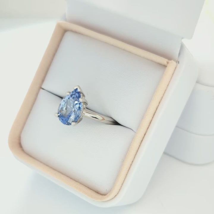 Liv engagement ring with pear blue lab sapphire