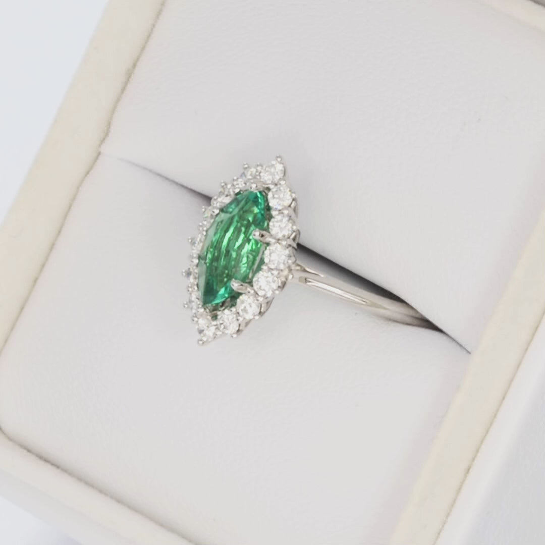 calypso halo ring in white gold with marquise green lab sapphire