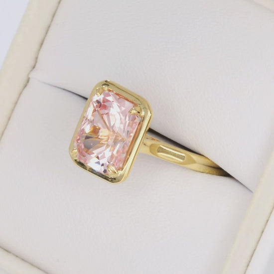 rory solitaire ring with radiant pink lab sapphire