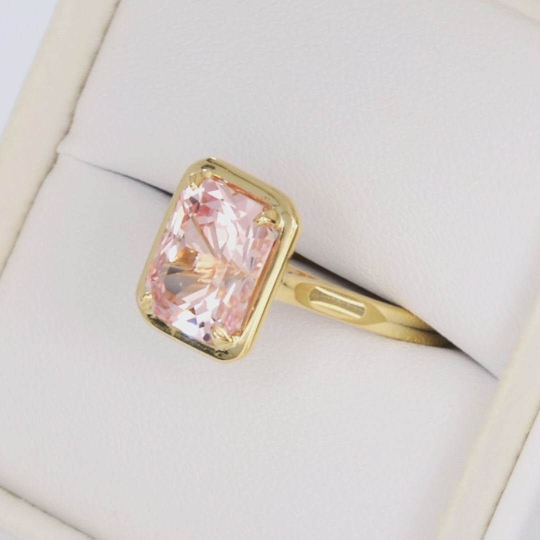 rory solitaire ring with radiant pink lab sapphire