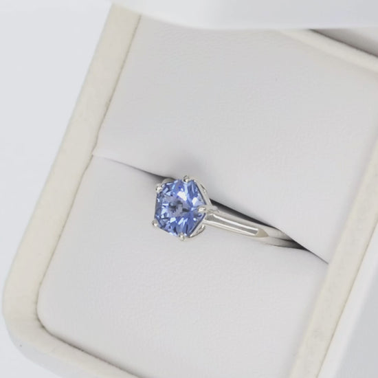ruth solitaire ring in white gold with blue hanami flower lab sapphire