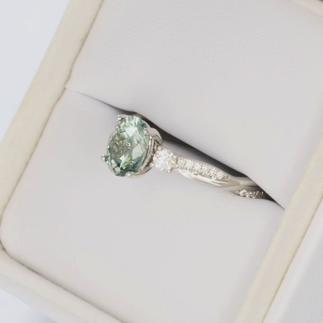 Giselle accented three stone ring in white gold with green oval lab sapphire