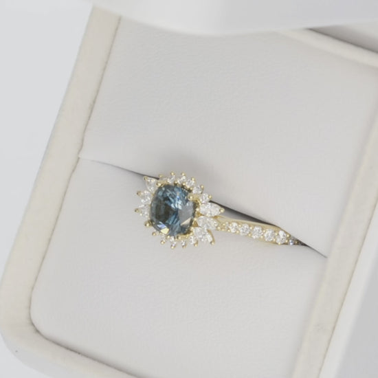 harper halo engagement ring in yellow gold with cushion montana sapphire