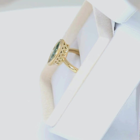 alexandra ring in yellow gold with marquise green lab sapphire