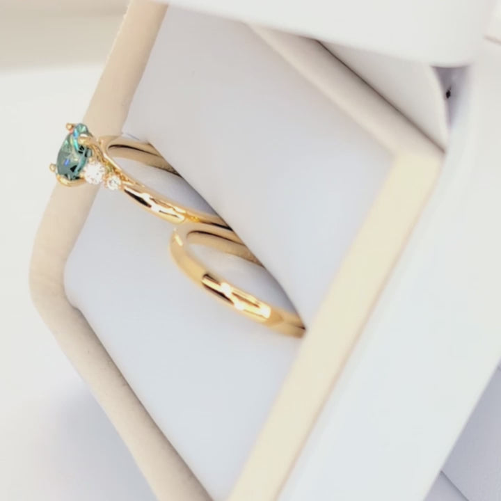 ariel wedding set with oval green moissanite