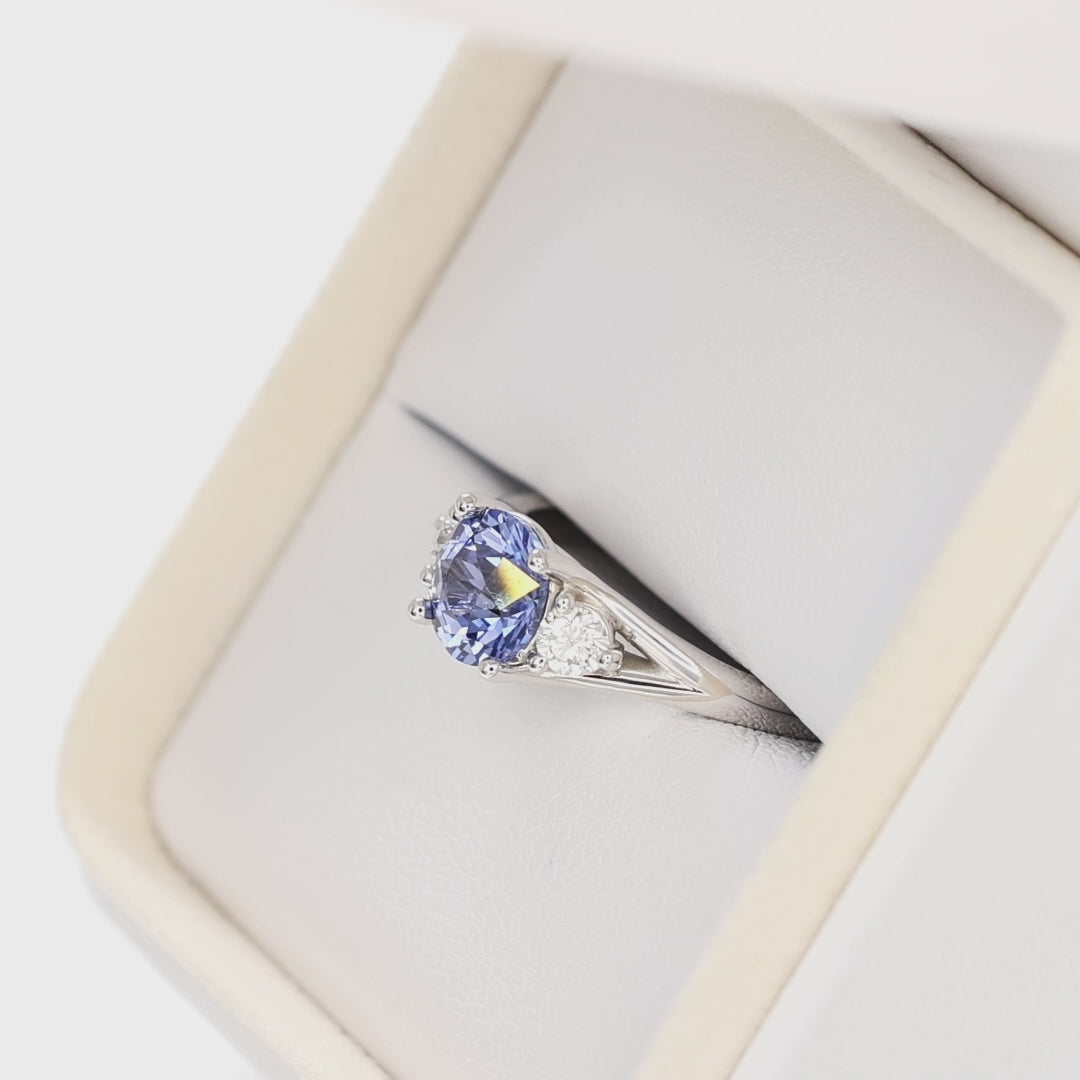 anastasia three stone ring in white gold with round periwinkle blue lab sapphire