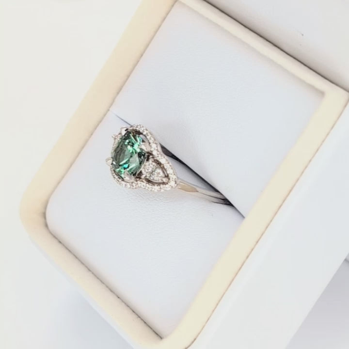 gayle three stone halo engagement ring with cushion green lab sapphire