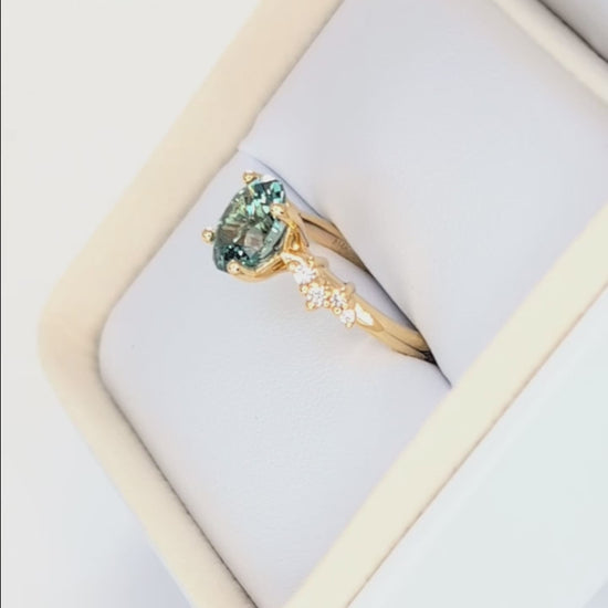 penelope engagement ring in yellow gold with oval green lab sapphire