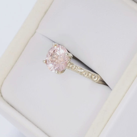 fleur nature inspired solitaire ring in silver with round pink lab sapphire