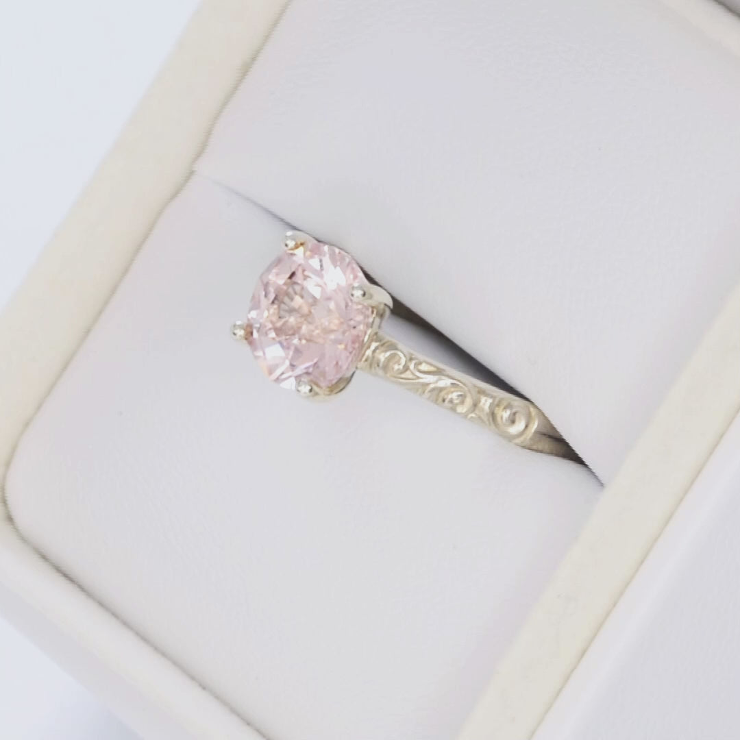 fleur nature inspired solitaire ring in silver with round pink lab sapphire