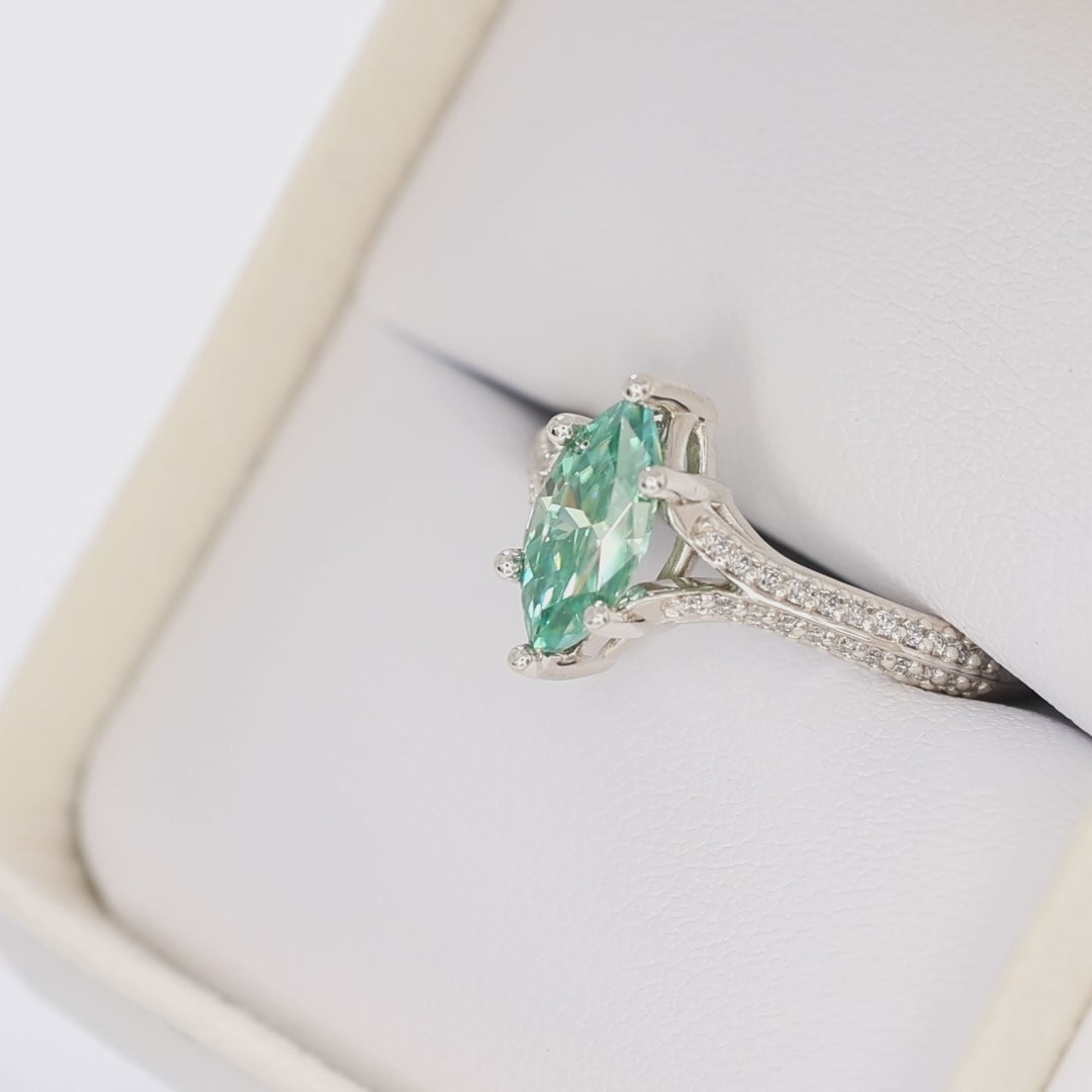 rosemary ring in silver with marquise green moissanite