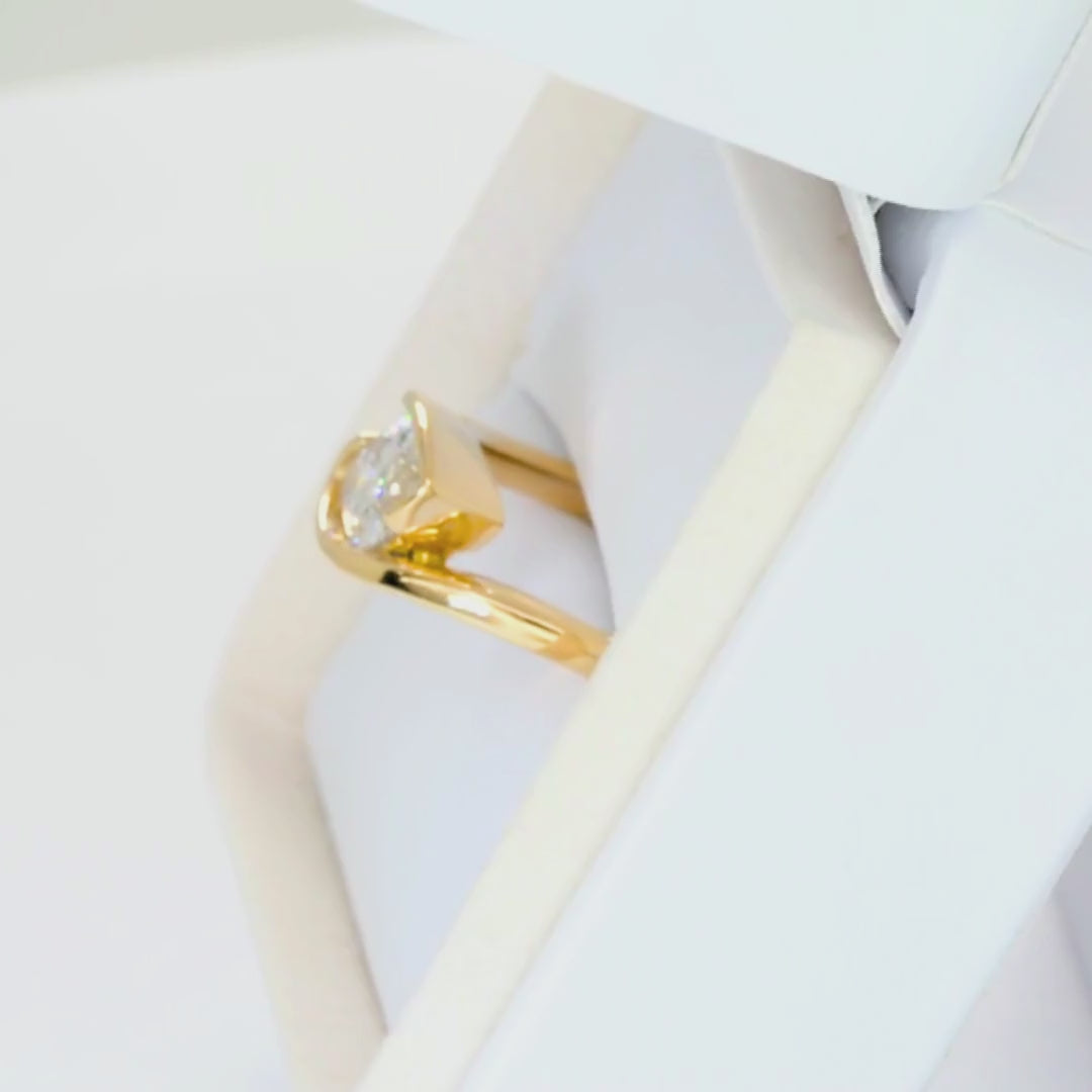 olivia bypass solitaire ring in yellow gold with marquise lab diamond