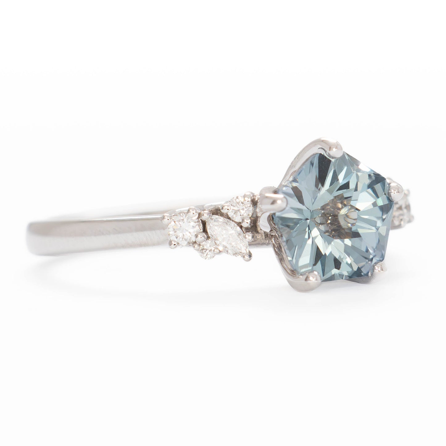rachelle engagement ring in white gold with flower blue lab sapphire