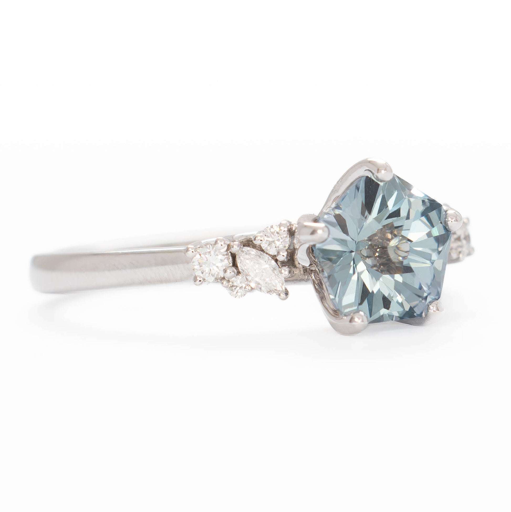 rachelle engagement ring in white gold with flower blue lab sapphire