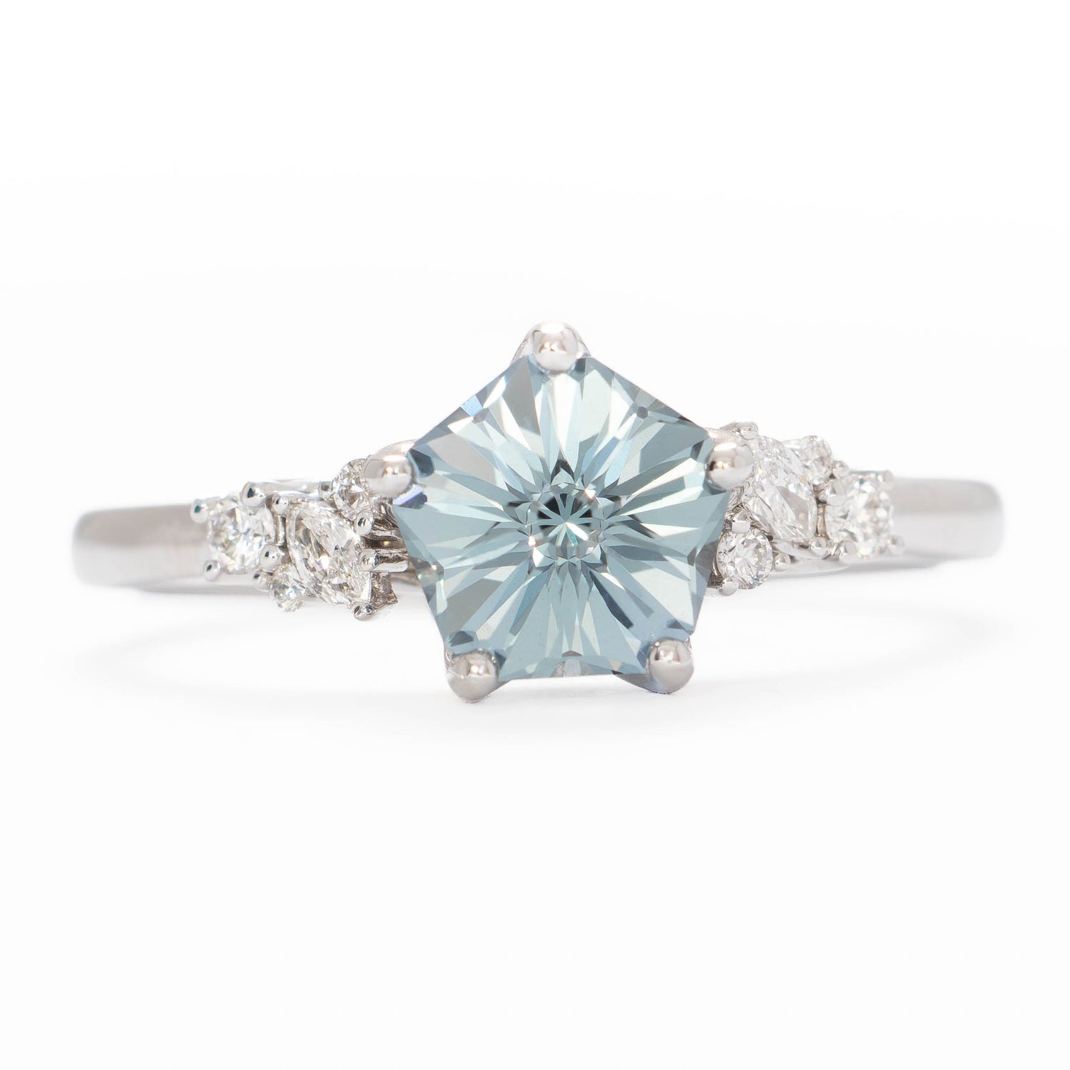 rachelle engagement ring in white gold with flower blue lab sapphire