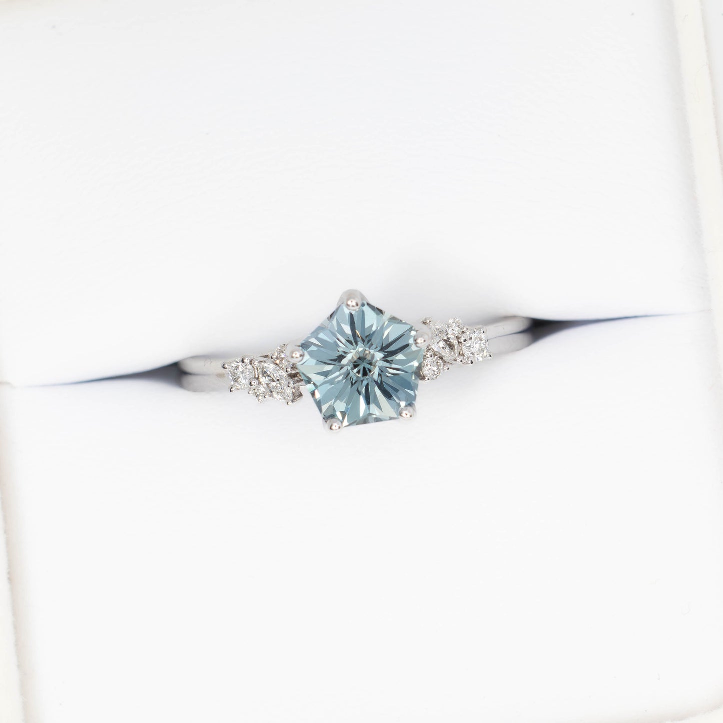rachelle engagement ring in white gold with flower blue lab sapphire