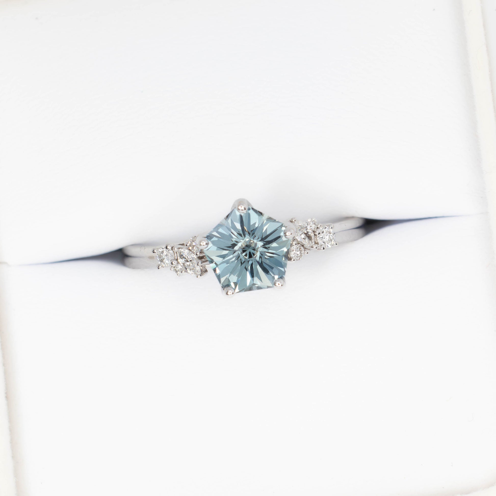 rachelle engagement ring in white gold with flower blue lab sapphire