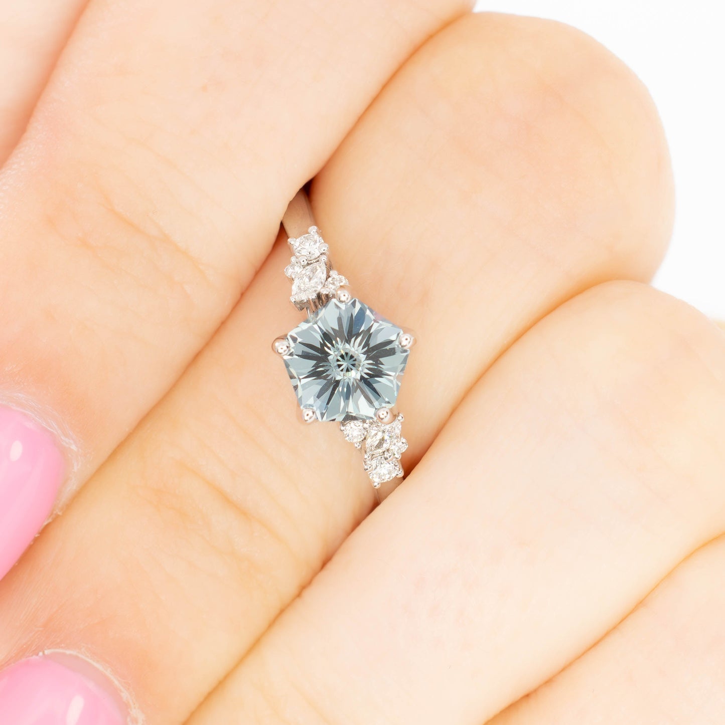 rachelle engagement ring in white gold with flower blue lab sapphire