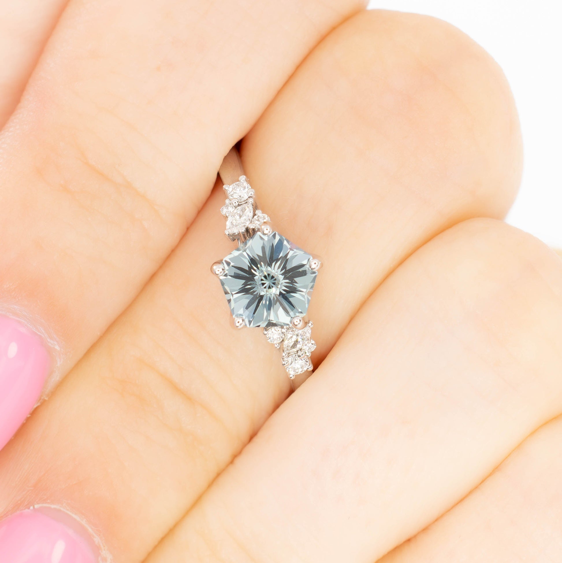 rachelle engagement ring in white gold with flower blue lab sapphire