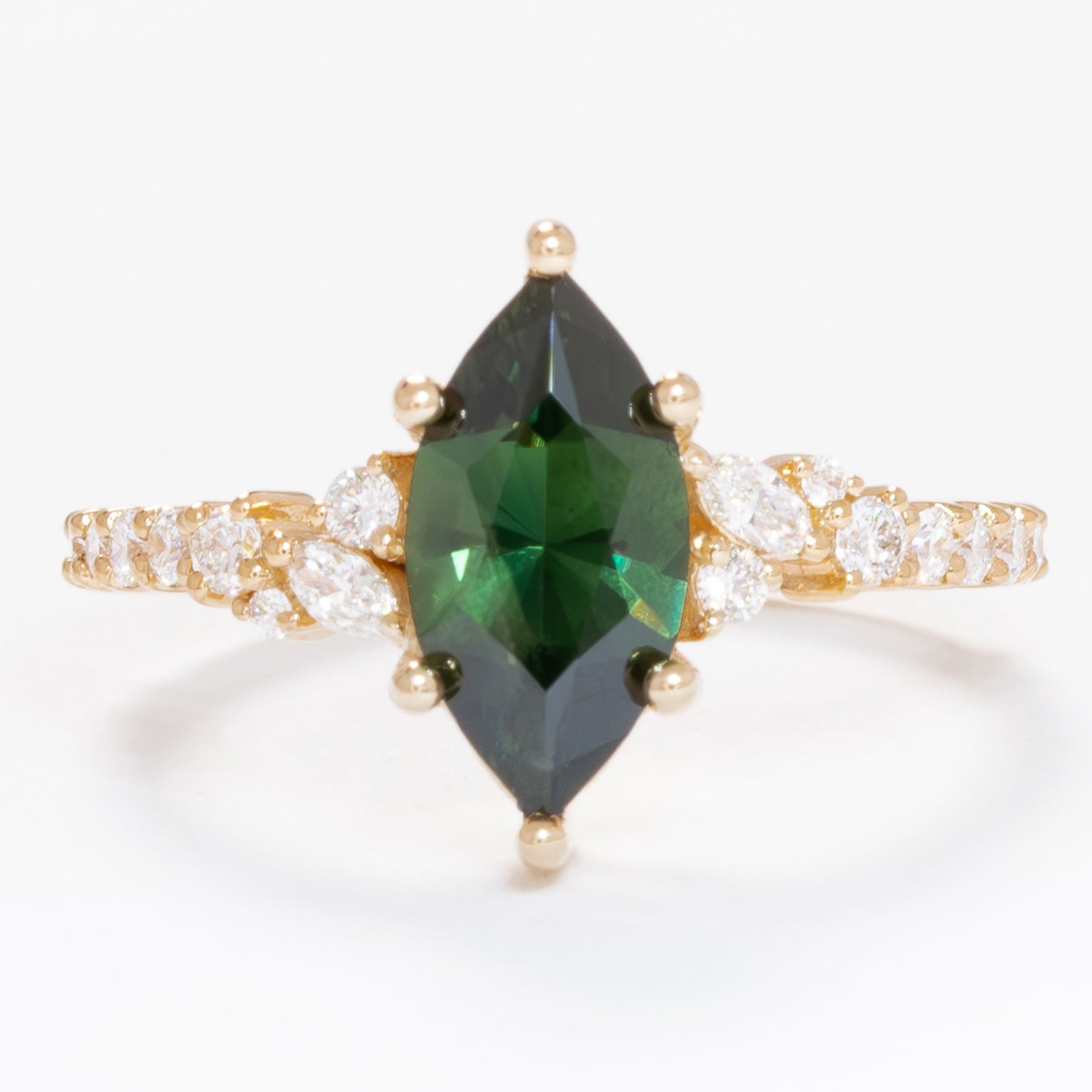 rachelle engagement ring with green australian sapphire marquise