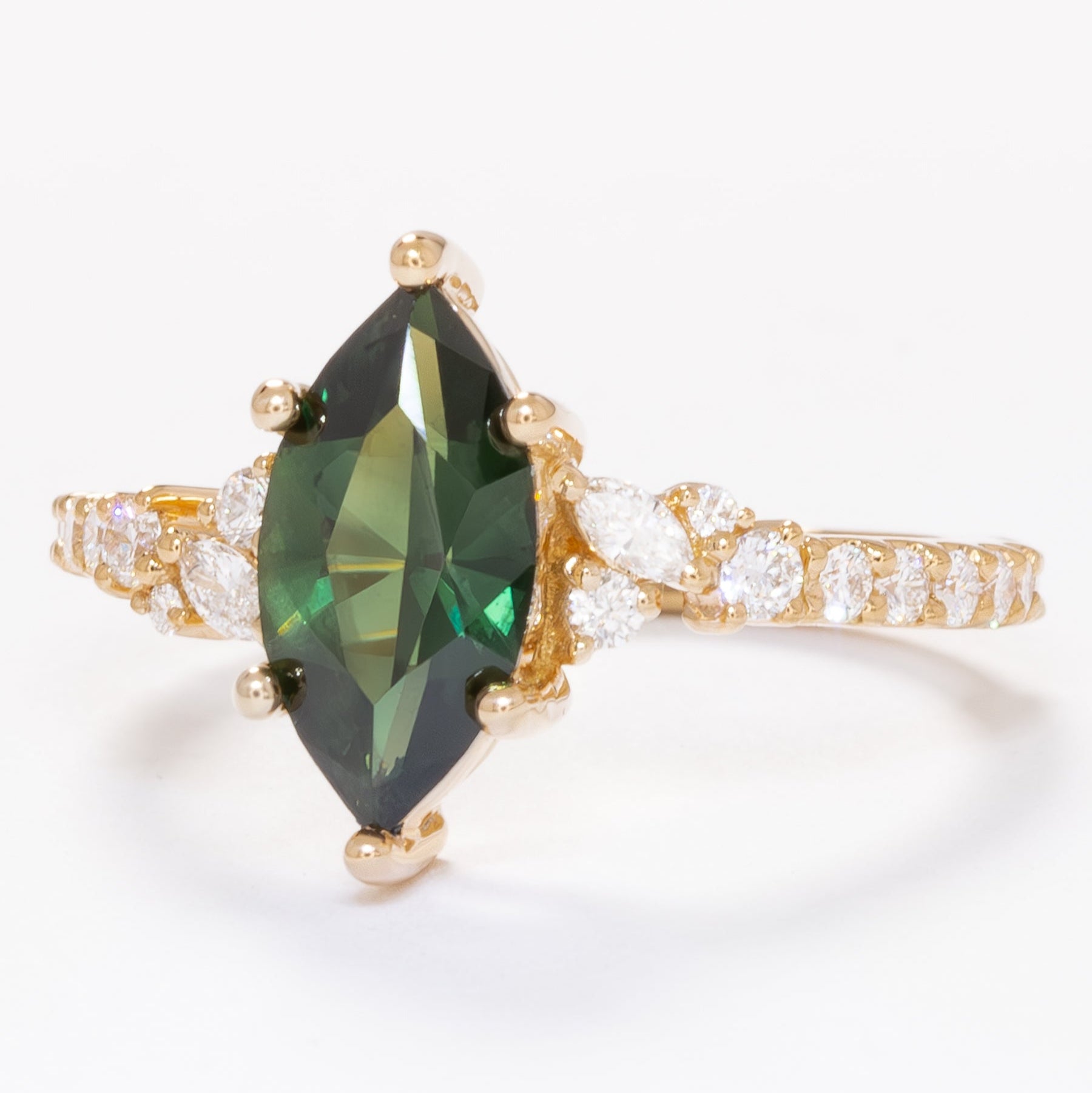 rachelle engagement ring with green australian sapphire marquise