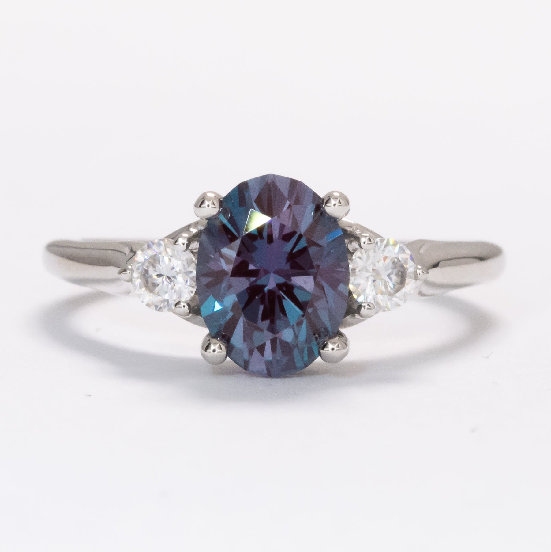 robin three stone engagement ring with oval lab alexandrite