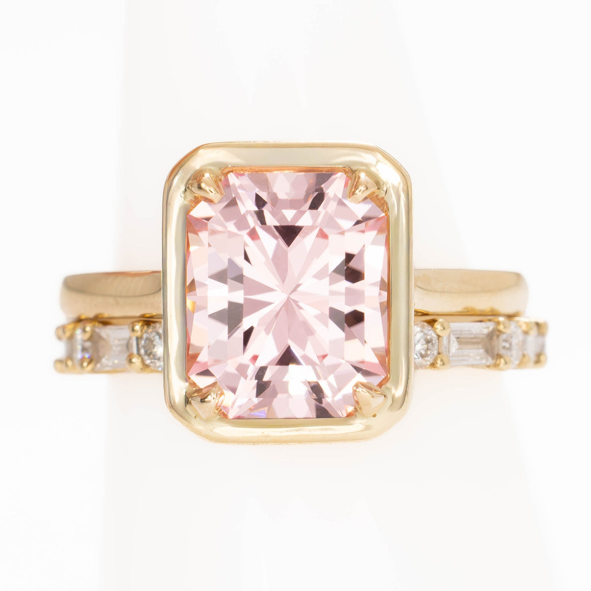 rory solitaire ring with radiant pink lab sapphire