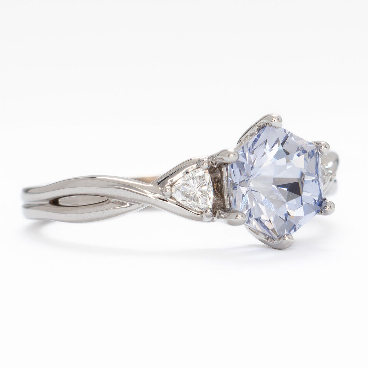 rosa three stone ring in white gold with light blue lab sapphire hex