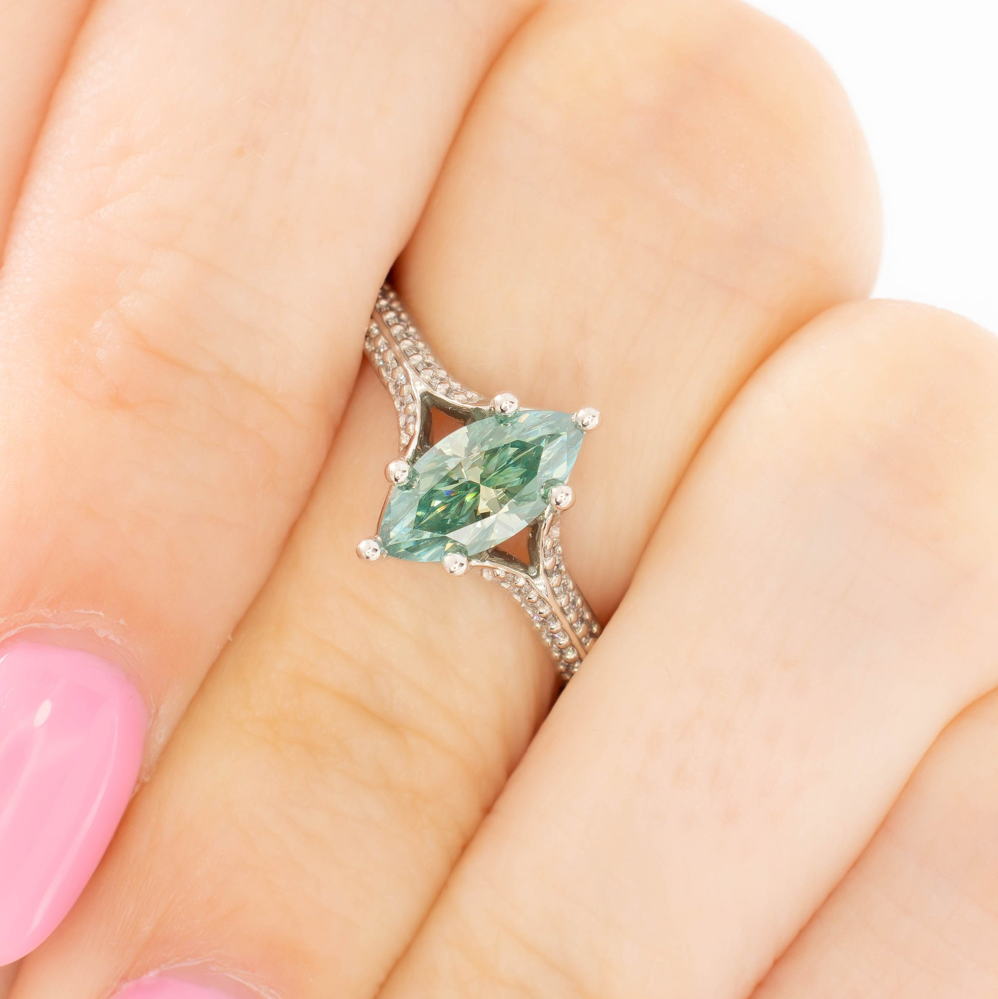 rosemary ring in silver with marquise green moissanite