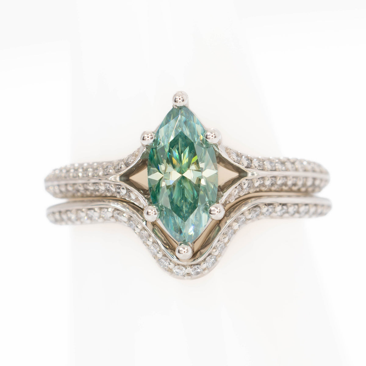 rosemary ring in silver with marquise green moissanite